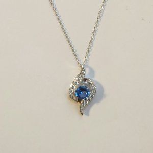 925S Blue topaz, silver necklace, twisted frame with studded cubic zirconia